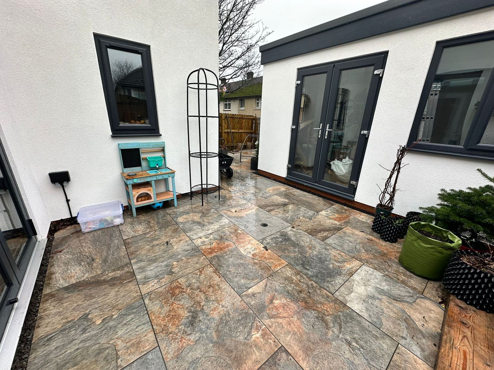 Porcelain patio outside a set of bifold doors